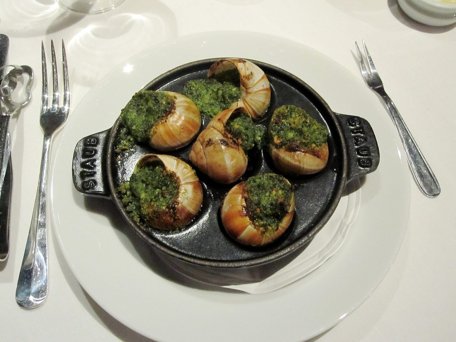 Lumache trifolate servite in tavola